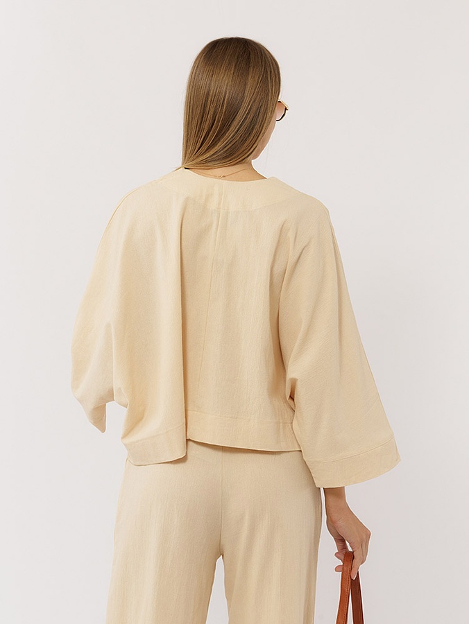 Жіноча блуза оверсайз 42 колір бежевий ЦБ-00219288 SKT000906952 фото